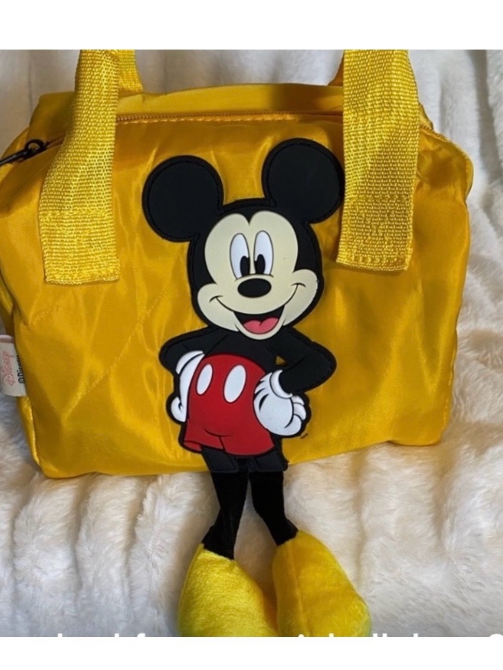 DISNEY Mickey Mouse Insulated Backpack in Yellow with Hanging Legs.